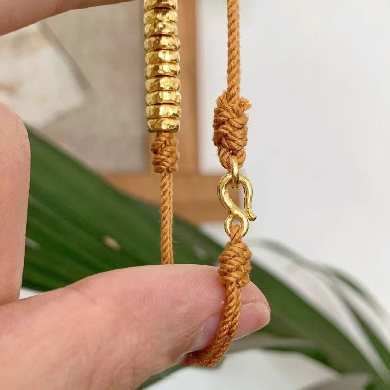Close-up of gilding texture and shine gold coil braceet