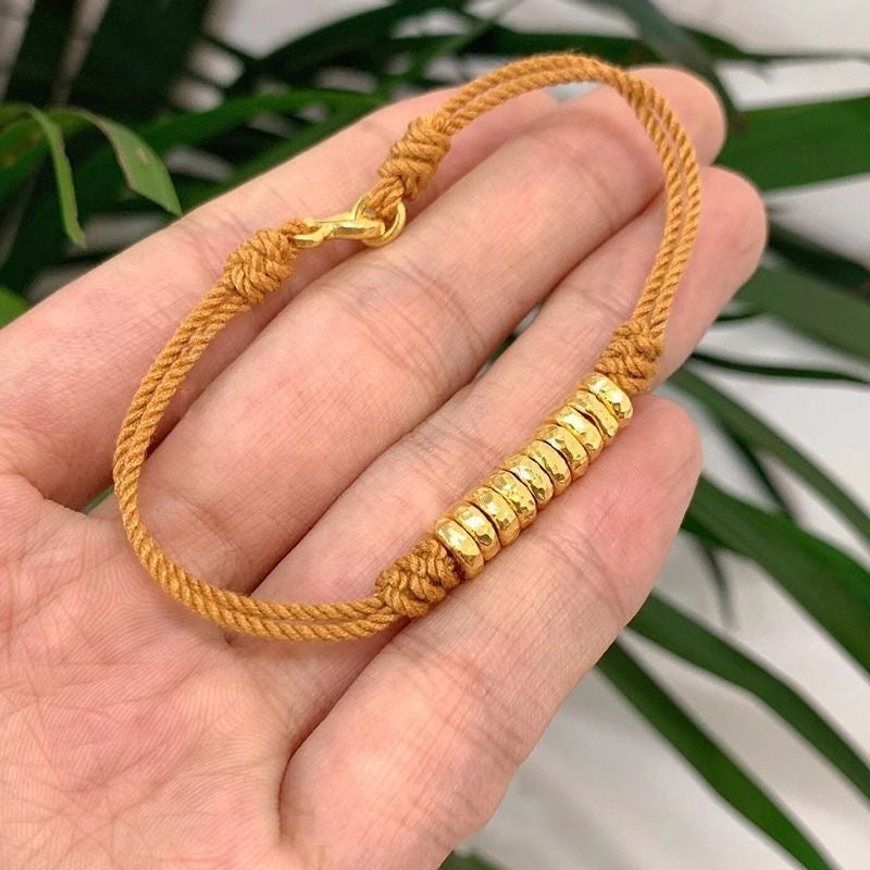 Bracelet on neutral textured background