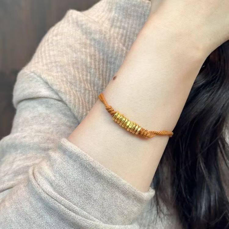 Hand-braided cord and 24K gilded coil