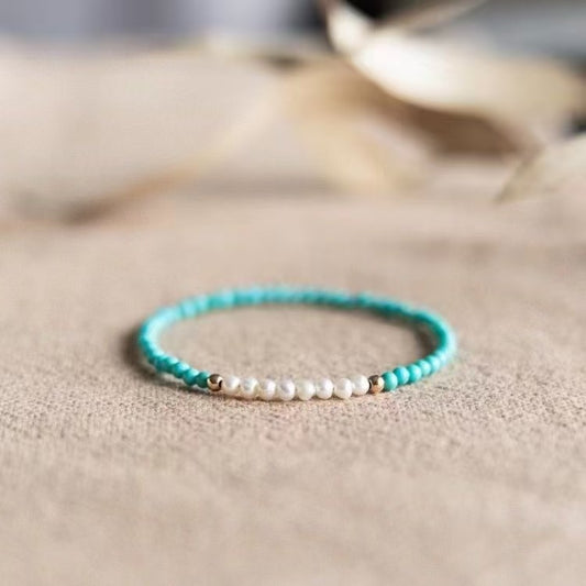 Buddha Beyond turquoise bead bracelet with freshwater pearls close-up