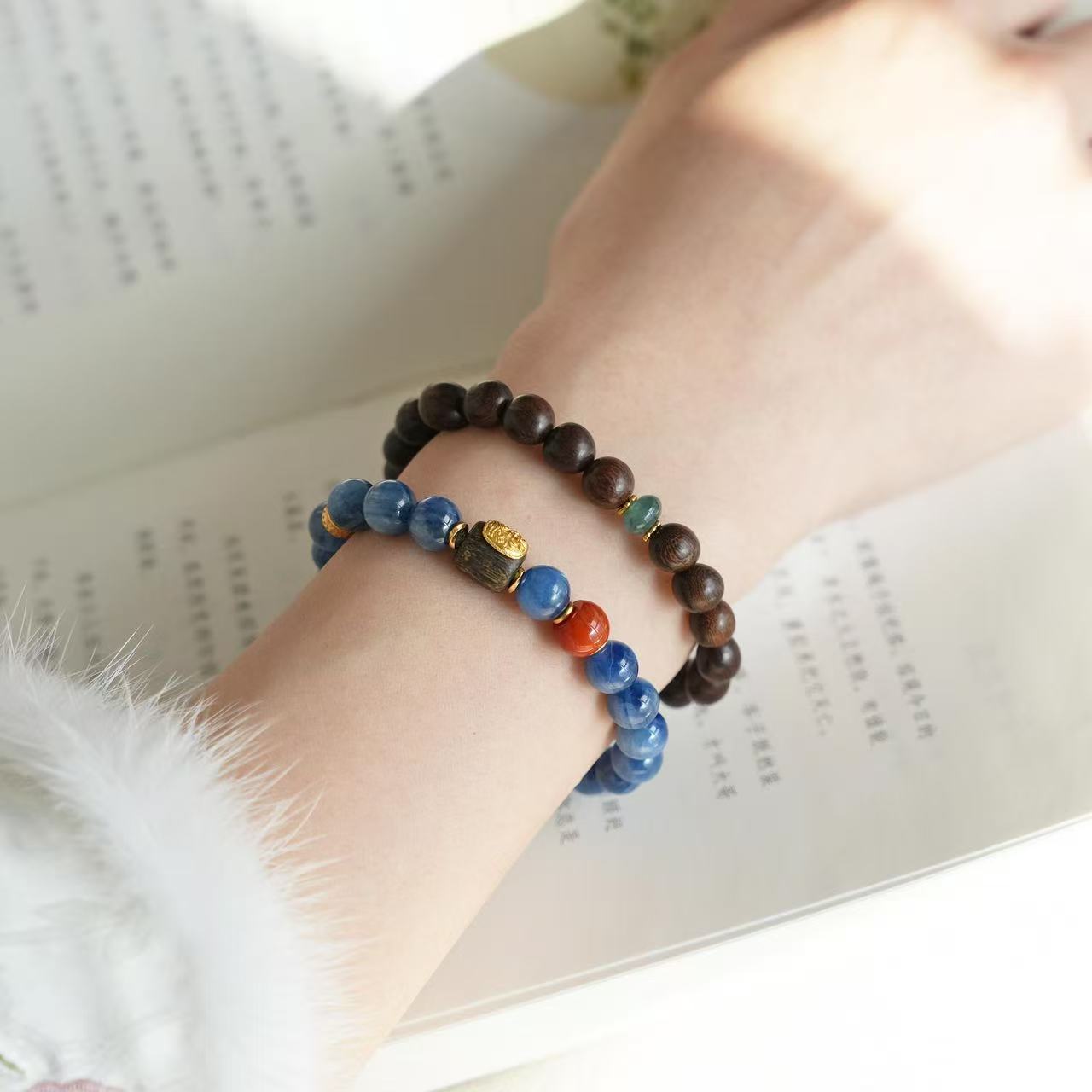 Spiritual mala-style bracelet with kyanite, red agate, and agarwood for balance and peace