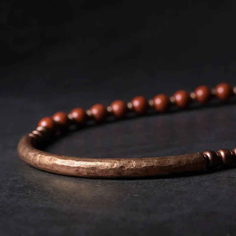 Artisanal jewelry piece highlighting the revitalizing effects of the Red Jasper gemstone