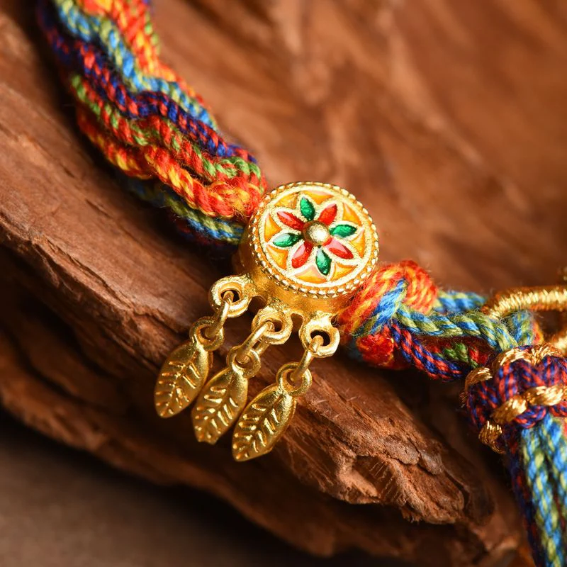 The Golden Feather Bracelet Symbolize wisdom and spiritual elevation, reflecting the wearer’s journey of spiritual development in Tibetan Buddhism