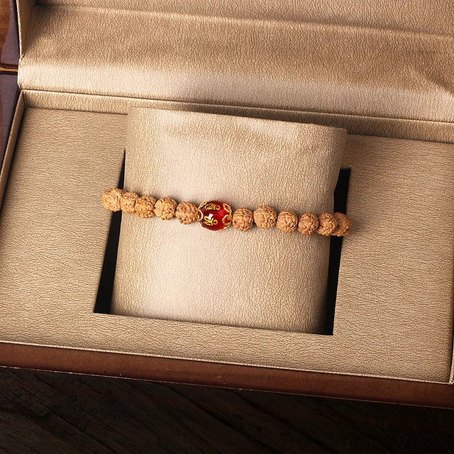 Rudraksha bracelet with vibrant citrine amber and red coral beads, uplifting and energizing style