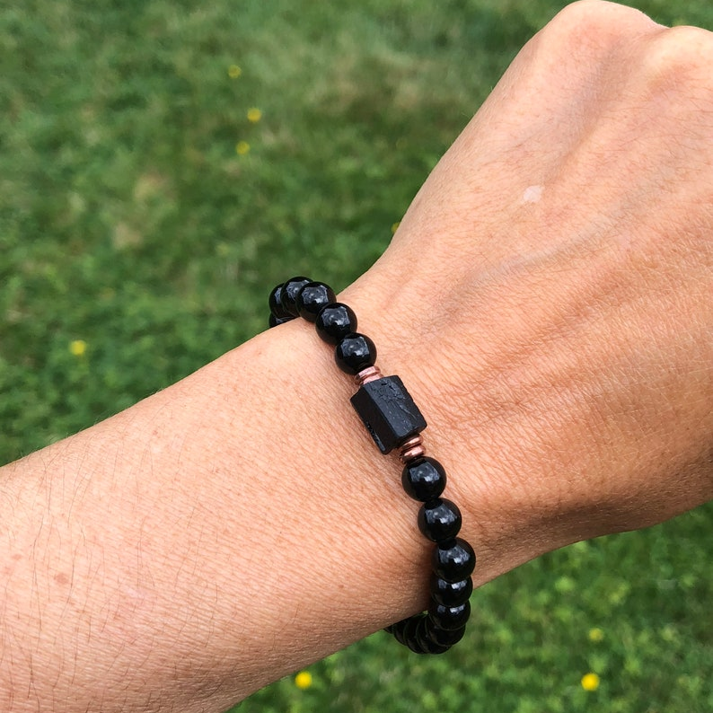 Black tourmaline bracelet worn on wrist for anxiety support and grounding daily energy