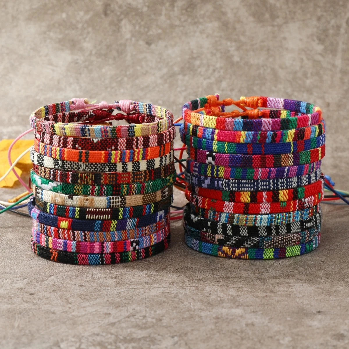 Assorted flat rope boho stack bracelets handmade with textile yarns