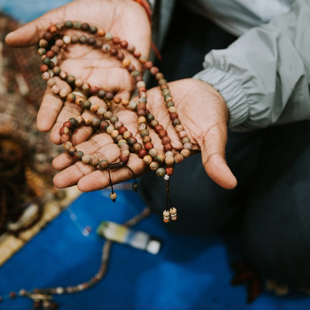 Riverstone beads showing earthy brown and green tones