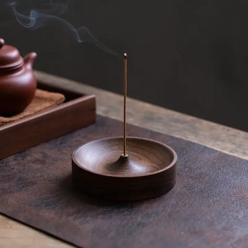 Minimalist round solid wood incense burner made from North American walnut