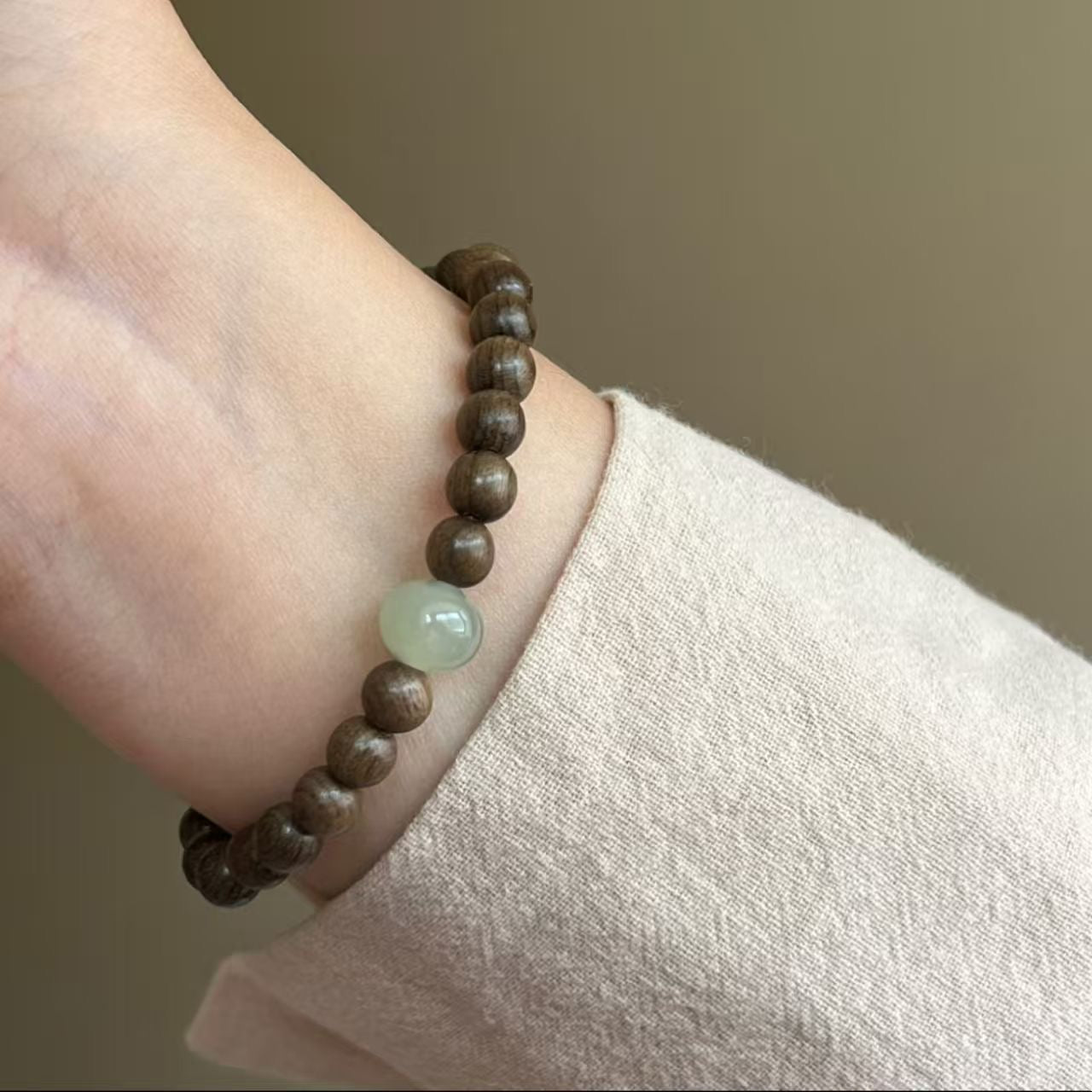 Sandalwood bracelet stack worn on wrist for everyday wear
