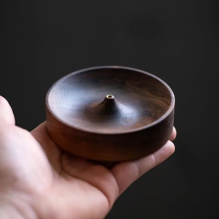 Close-up of walnut incense tray showing satin polished surface and fine texture